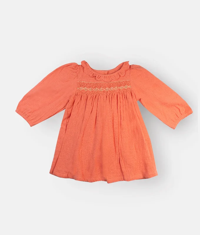 Orange Muslin Smocked Long Sleeved Girls Dress