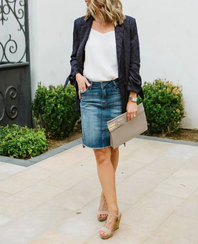 Connie Step Hem Denim Skirt In Blue ruffled skirt detail